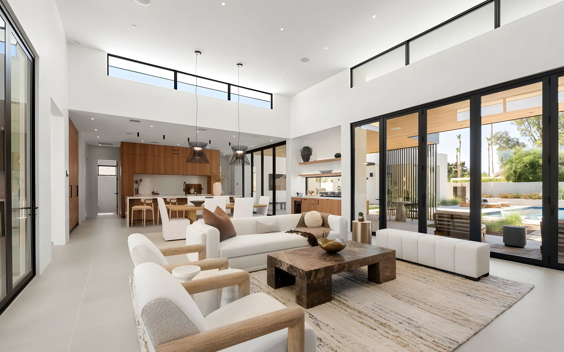 Great room opening to the pool through full-height glass, McCormick Ranch, Scottsdale
