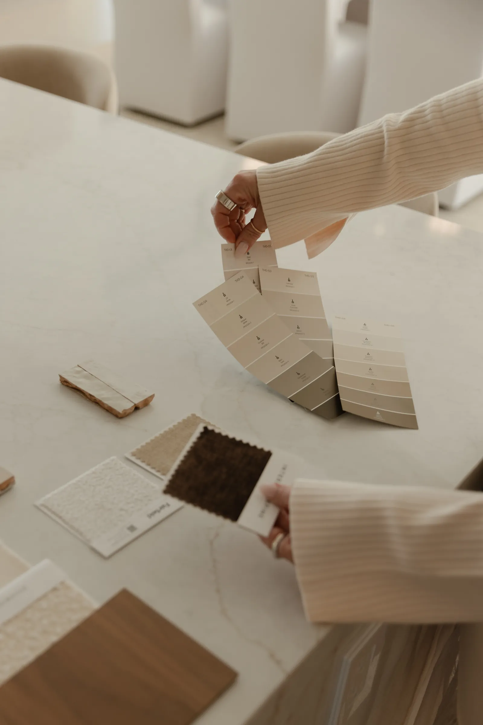 Material and finish samples laid out during a selection meeting